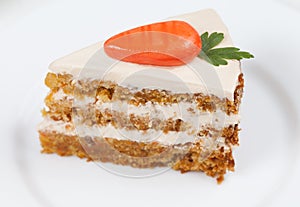 Slice of homemade tasty carrot sponge cake