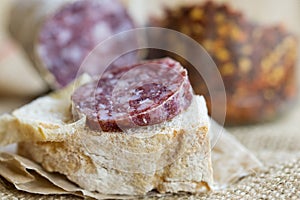 Slice of hot salami on a piece of bread