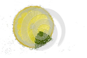 Slice of a lemon in carbonated water