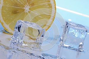 Slice of lemon and ice cubes