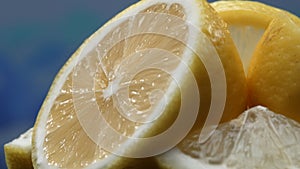 A slice of lemon, lies exposed. The flesh with refreshing juice. Comestible.