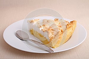 Slice of lemon meringue pie