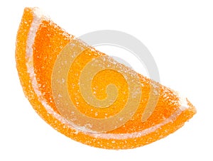 A slice of marmalade orange is isolated on a white background. Marmalade candy