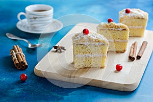 Slice of mille-feuille cake with cranberries and sweet cream stuffing