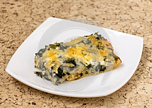 Slice of Ossetian pie with cheese and herbs