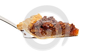 A slice of pecan pie on white