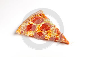 Slice of Pepperoni Pizza on white background.