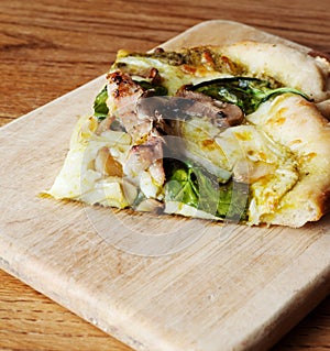 Slice of pesto pizza