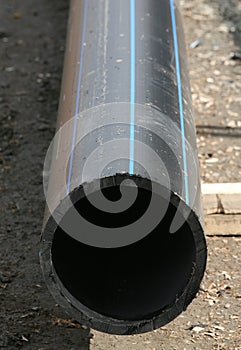 A slice of plastic pipe for cables