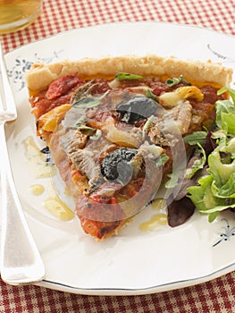 Slice of Provencale Tart with Dressed salad