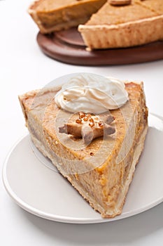 Slice of Pumpkin pie with whipped cream