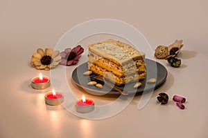 Slice of Queen Maria Cake with Walnuts and Almonds