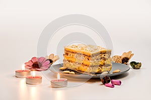 Slice of Queen Maria Cake with Walnuts and Almonds