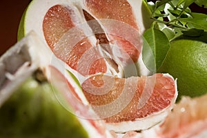 Slice of Red Pomelo citrus fruit