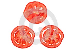 Slice red ripe tomato isolated top view, fruit and vegetable concept