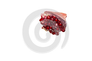 Slice ripe pomegranate isolate white background