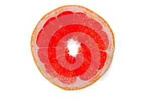 Slice of ruby grapefruit on white