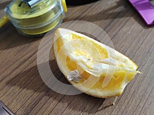 Slice of squeezed juicy lemon