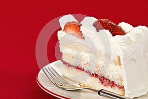 Slice of strawberry cream cake