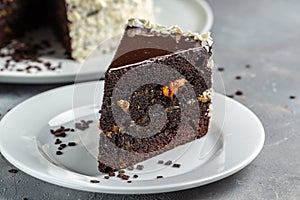 Slice of tasty homemade chocolate cake. Food recipe background. Close up