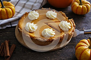 Slice of thanksgiving traditional pumpkin pie