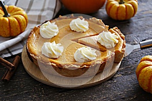 Slice of thanksgiving traditional pumpkin pie