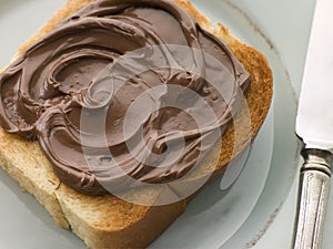 Slice of Toasted brioche with Chocolate Spread photo