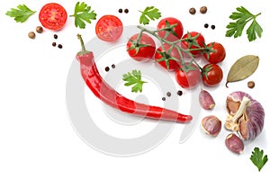 slice of tomato with chili pepper, garlic and parsley isolated on white background. top view