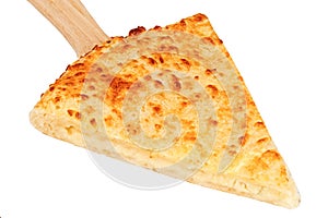 Slice of traditional homemade Georgian cheese pie filled with suluguni