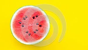 Slice of watermelon on yellow background