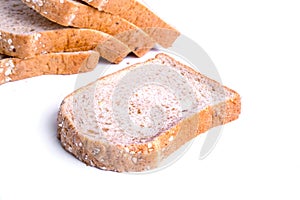 Slice whole wheat bread isolated on white background