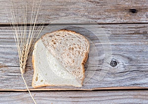 Slice of whole wheat bread and white bread melded together.