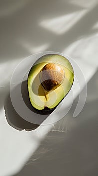 Sliced avocado on plain background