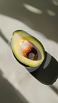 Sliced avocado on plain background