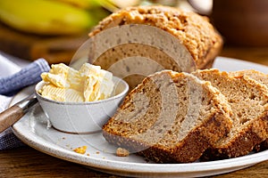 Sliced Banana Nut Loaf Cake on a Plate