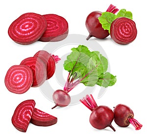 sliced beetroot with green leaves isolated on white background. clipping path
