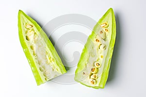 Sliced bitter melon on white background