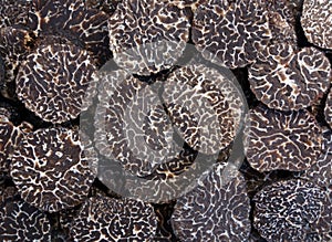 Sliced black truffes