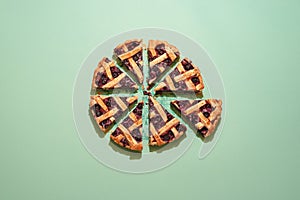 Sliced blueberry pie. Lattice crust cake top view