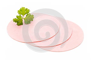 Sliced boiled ham sausage isolated on white background, top view