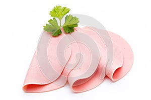 Sliced boiled ham sausage isolated on white background, top view