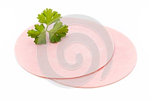 Sliced boiled ham sausage isolated on white background, top view