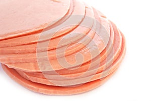 Sliced of bologna ham isolated