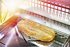 Sliced bread in cutting machine