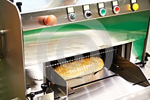 Sliced bread in cutting machine