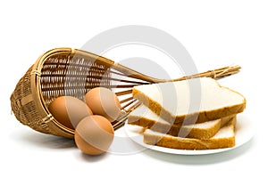 Sliced of bread and eggs