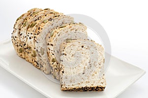 Sliced bread with pumpkin seeds and sesame