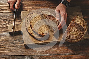 Sliced bread on a wooden board