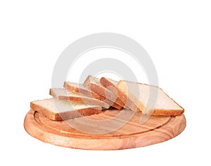 Sliced bread on a wooden chopping board isolated