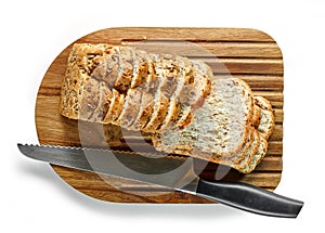 Sliced bread on wooden cutting board